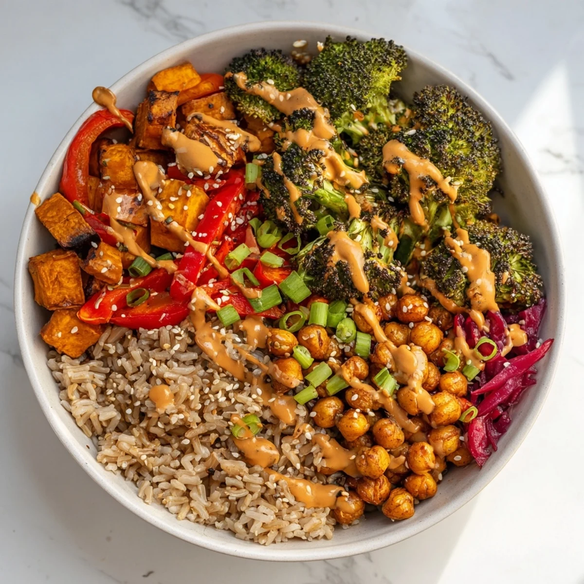 Vibrant Bold Sauce Drizzle Bowls topped with roasted veggies and colorful sauces.  