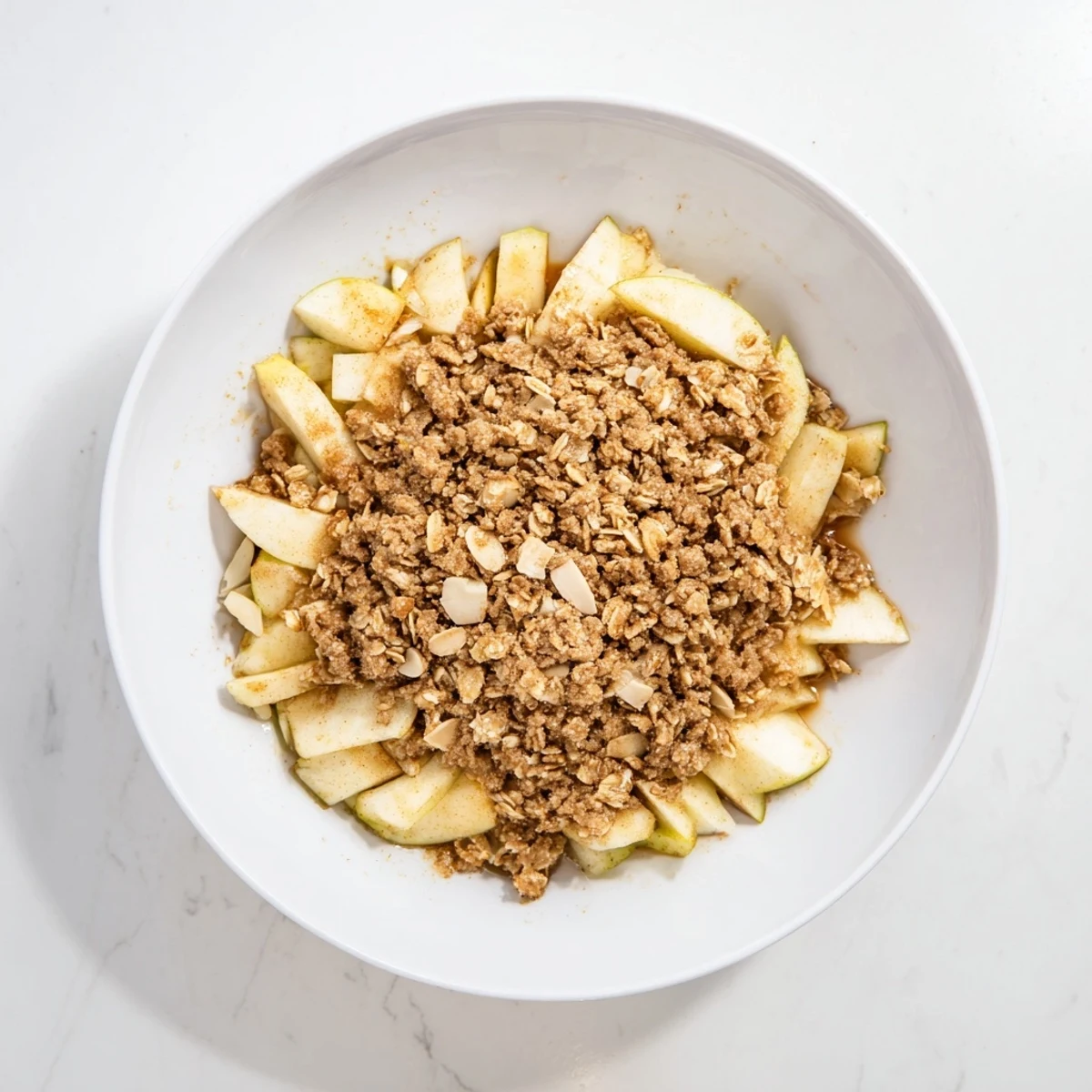 Close-up of the cinnamon-spiced Best Apple Crisp, a comforting, bubbly American dessert just out of the oven.