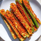 Close-up of golden Taco Pickles, ideal side for tacos, offering tangy, zesty flavor.