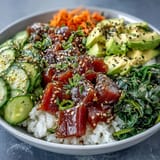 Refreshing canned tuna poke bowl piled high with vibrant vegetables.