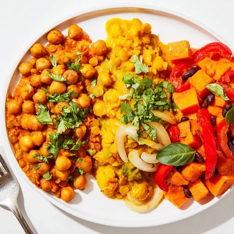 A colorful display of Single-Pan Global Curries, showcasing Indian, Thai, and Caribbean flavors.