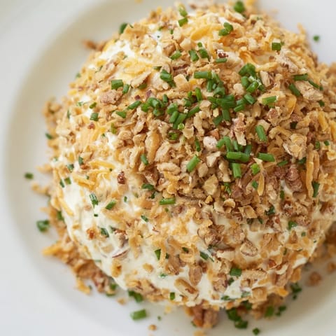 Close-up of a creamy Classic Cheese Ball with Ranch Seasoning, perfect appetizer for gatherings.