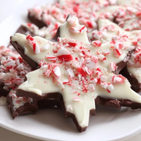 Enjoy delightful Peppermint Bark Snowflakes, a sweet treat with crunchy peppermint, perfect for holiday gifting in America.