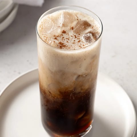 Rich espresso and oat milk create a delicious Iced Brown Sugar Oat Latte, perfect for summer.